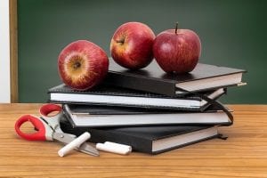 Books and Apples for financial independence for teachers