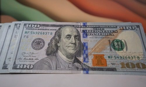 Picture of hundred dollar bill representing a dividend
