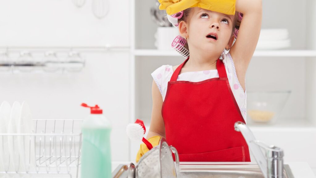 Little girl doing chores