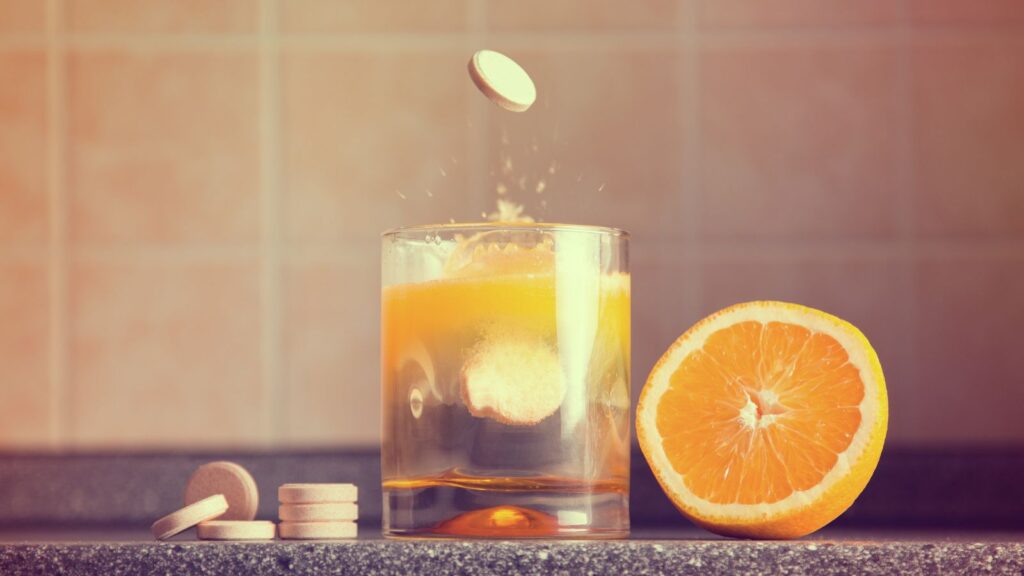 Photo of oranges and juice vitamin C serum. 